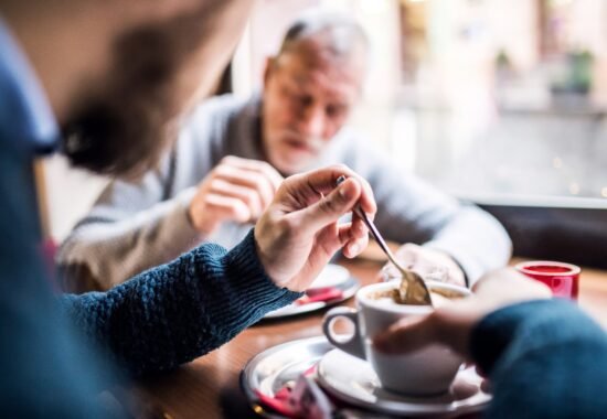 Person stirring tea